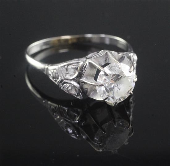 An 18ct white gold and single stone diamond ring with diamond set shoulders, size Q.